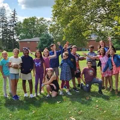 Group of middle school students playing outside.